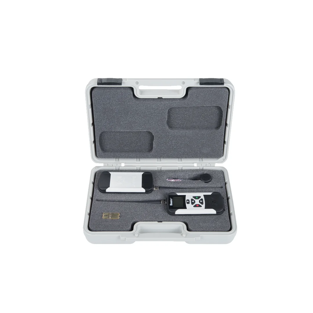 ROAM XL Remote Kit, includes transmitter, receiver, SmartPort Wiring Harness, 4 x AAA batteries, and plastic carrying case - Image 1